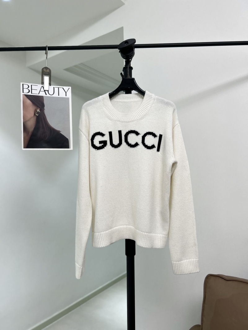 G*u*i sweaters